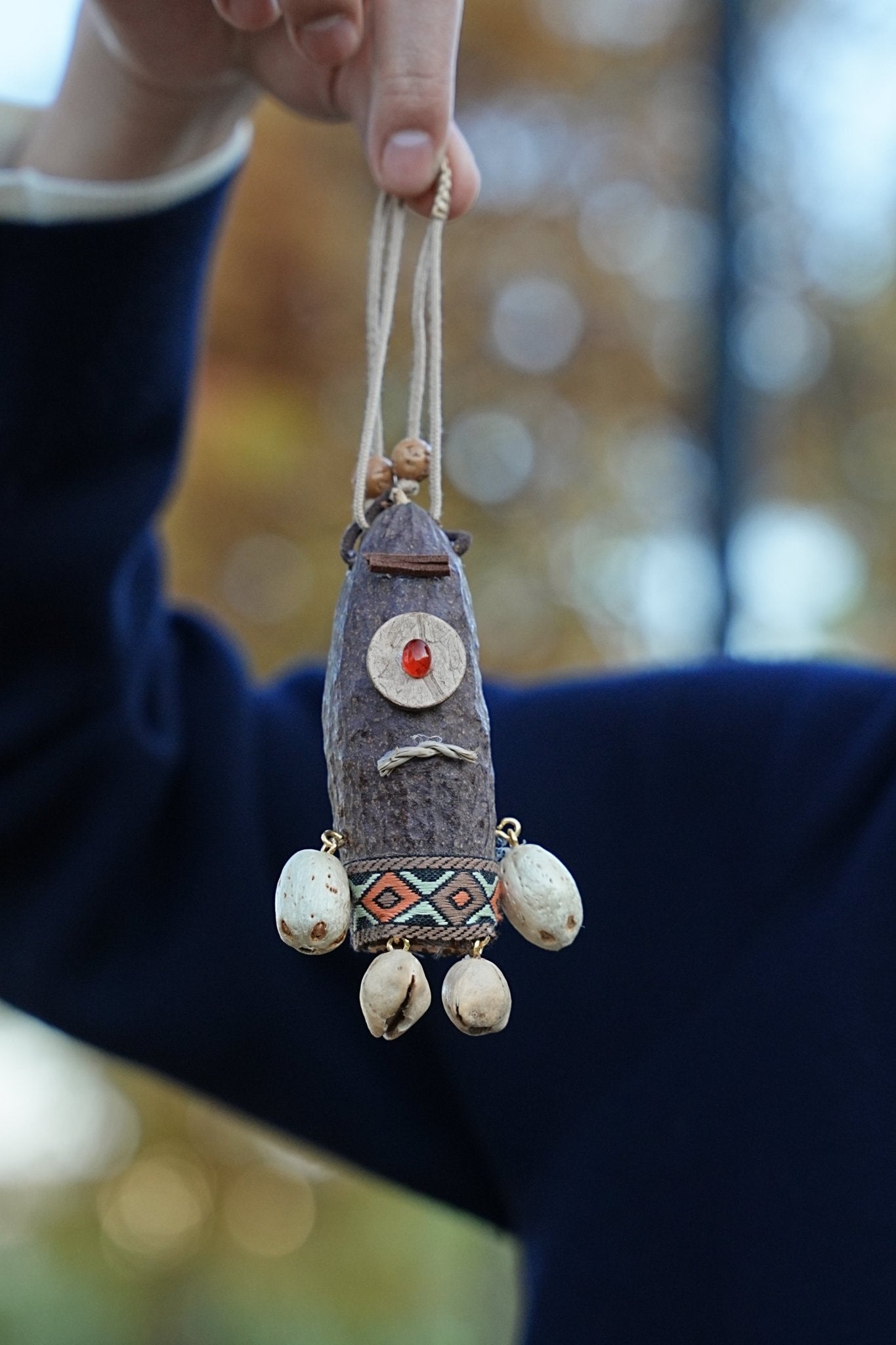 "The Tribal Cyclops" - Handcrafted Seed Pod Totem with Woven Belt & Single Eye